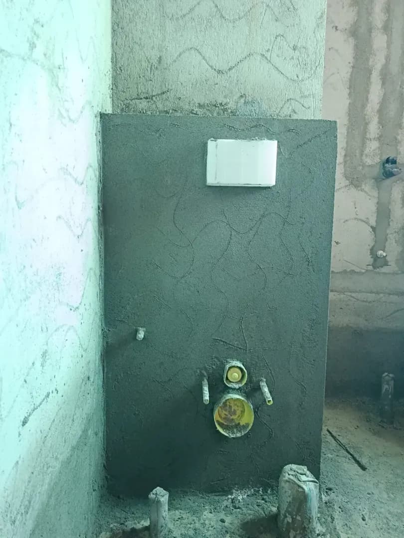 FLUSH TANK PLASTERING