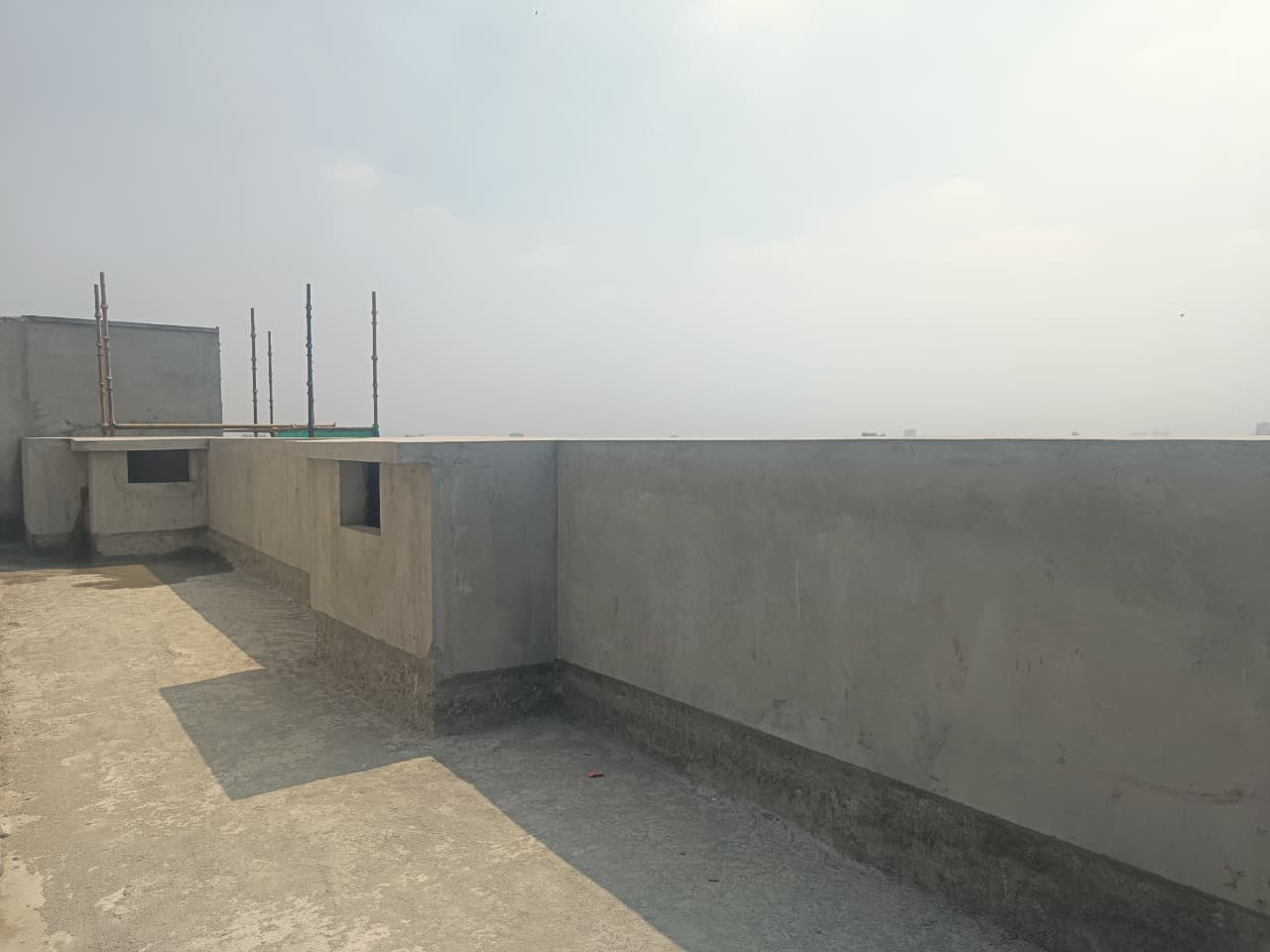 SOUTH SIDE TERRACE PARAPET PLASTERING